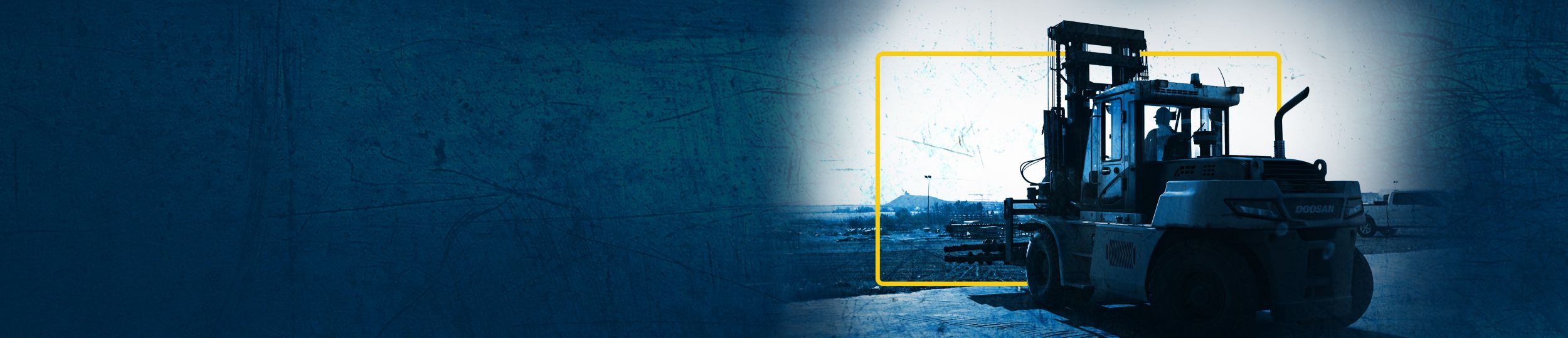 Service center employee operating machinery