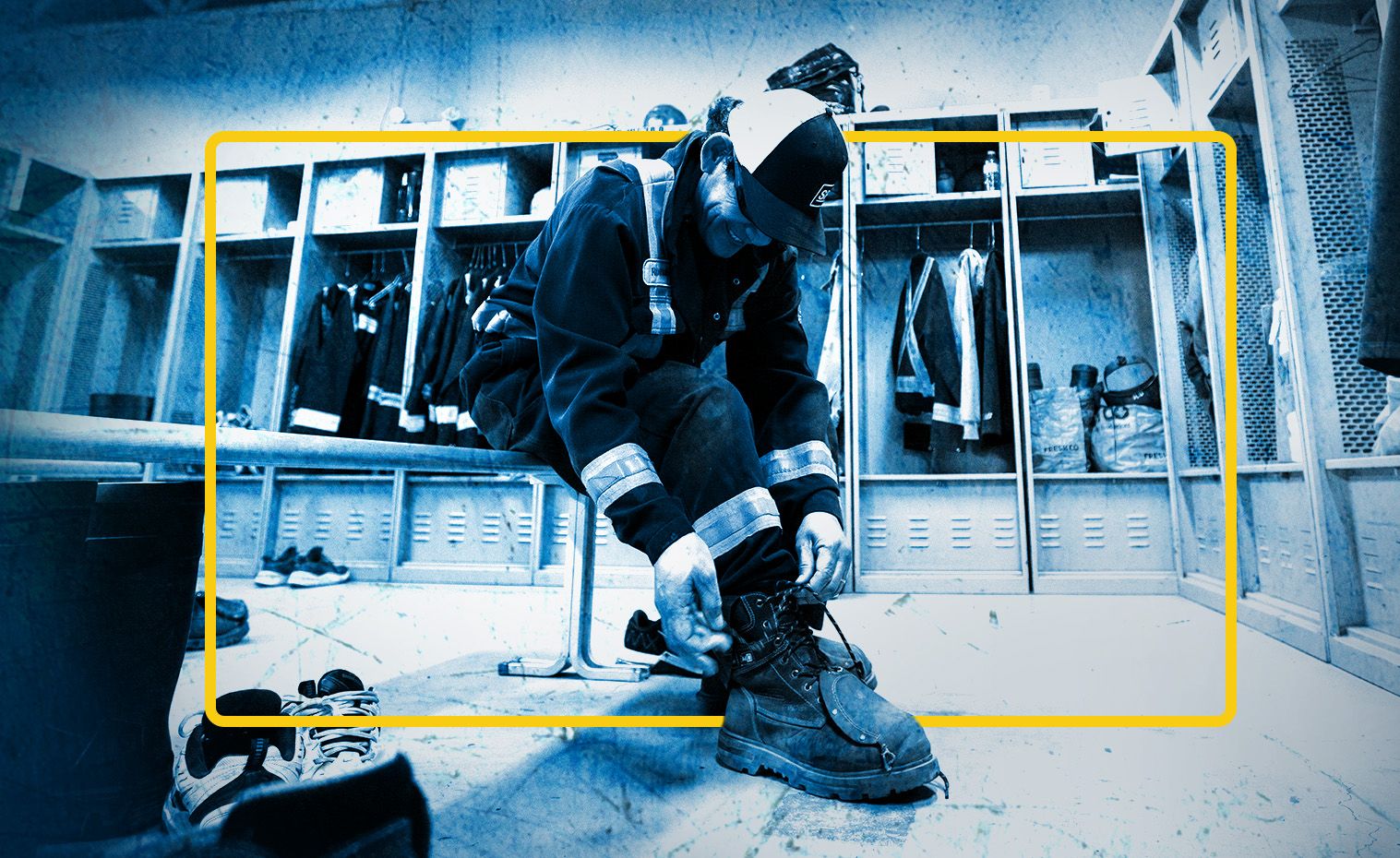SPM employee tying shoe while at service center