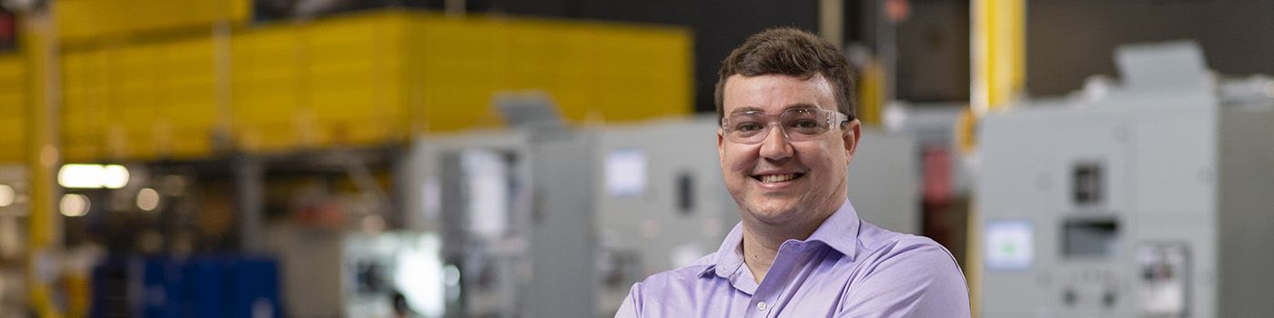 Cat employee smiling at camera