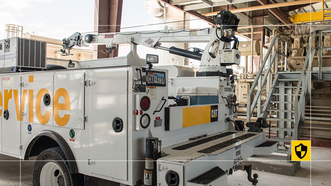 back and side view of a Cat Service vehicle