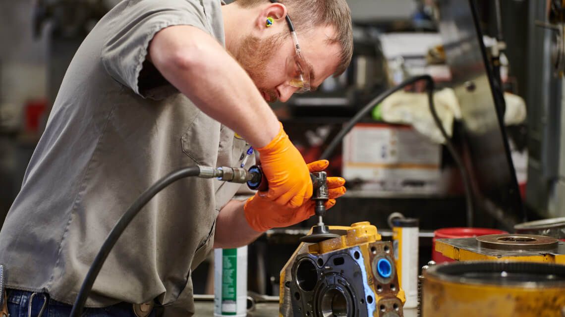 technician working on a rebuild