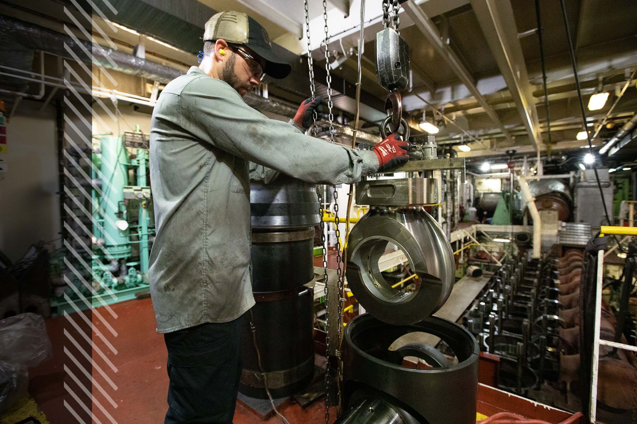 MaK employee working on engine