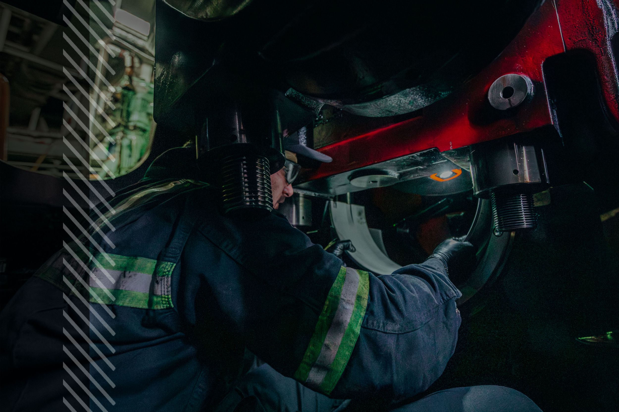 MaK employee working on engine