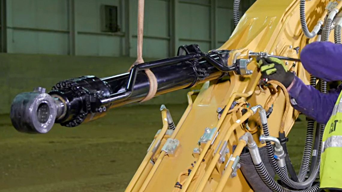 technician installing a cylinder