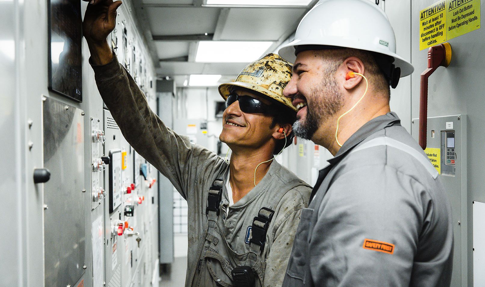 Workers inspecting controls