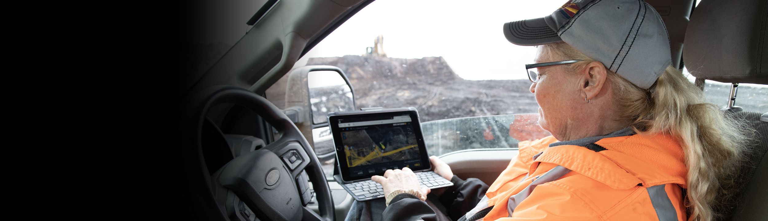 Woman operating machine using technology