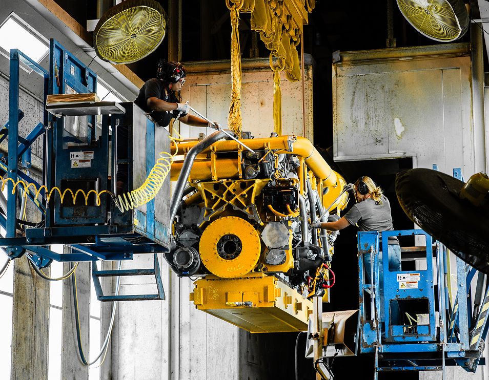 Renowned Global Support, engine being worked on in warehouse