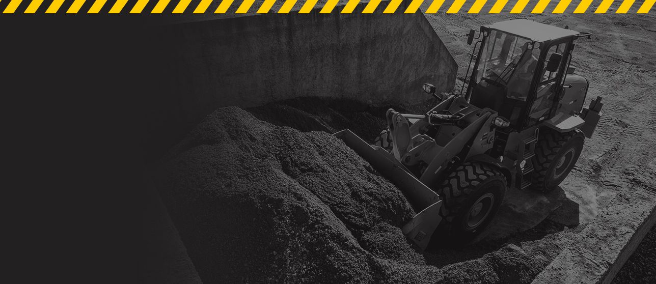 Cargadoras compactas Cat® traseras y blancas