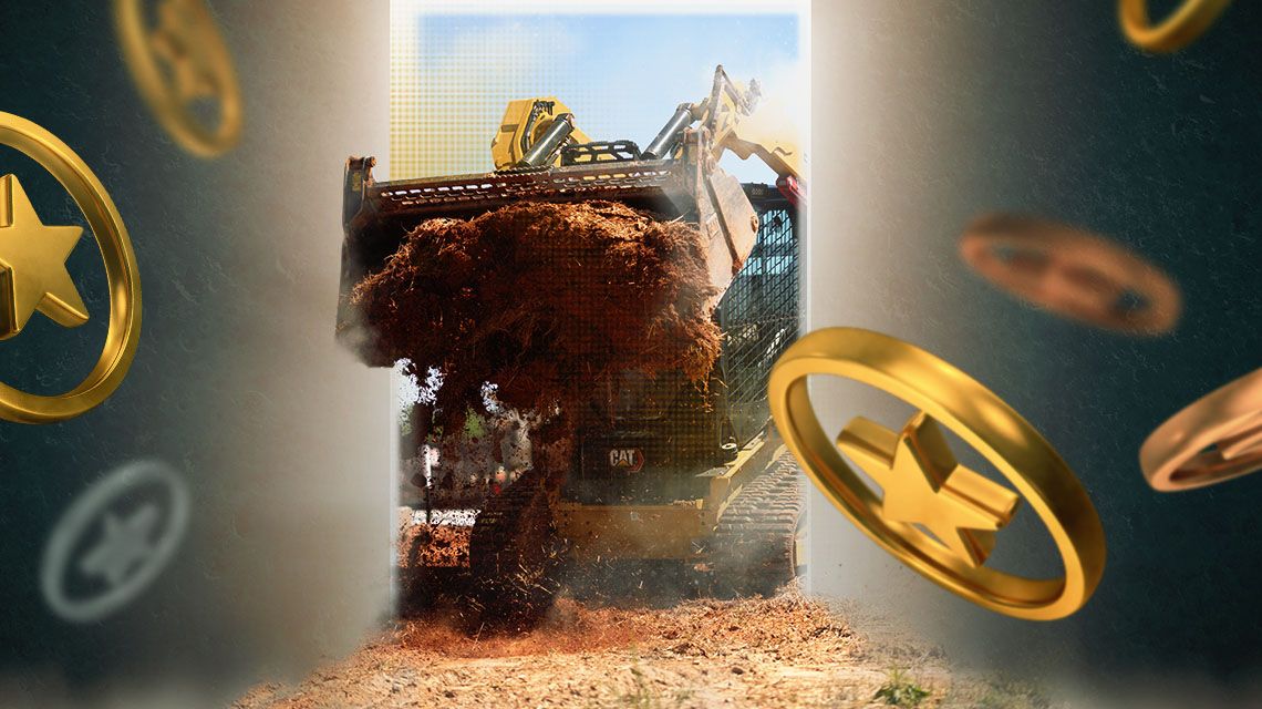 Cat tractor dumping dirt