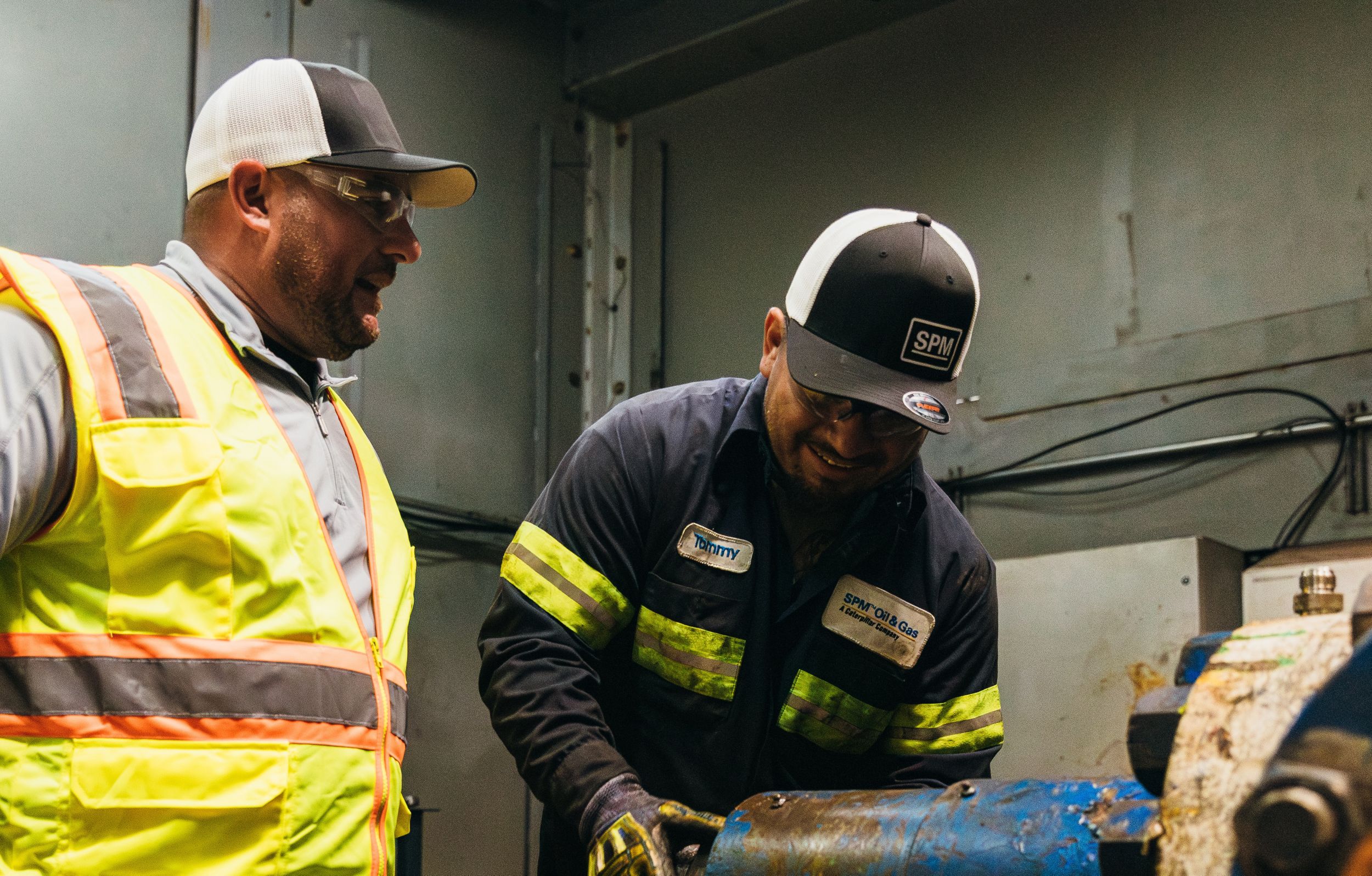 Service team repairing equipment