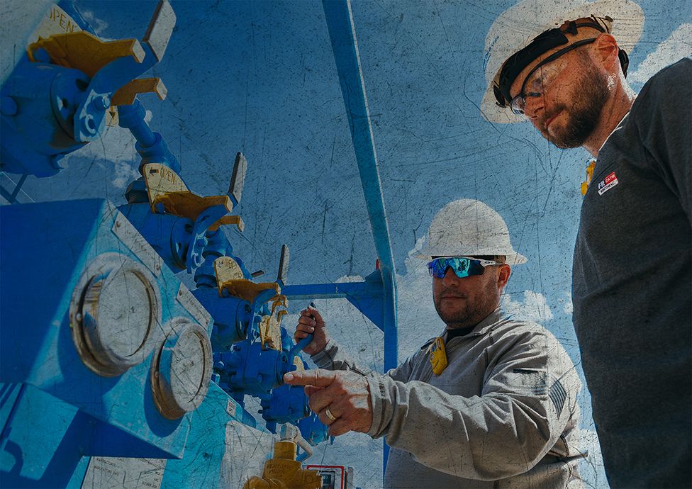 Two SPM employees working on a site