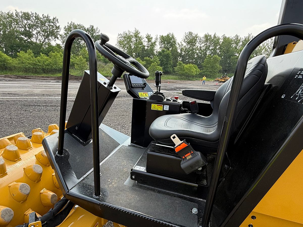 Operator station on Cat CP5 vibratory soil compactor
