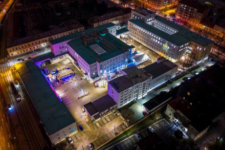 Aerial view of building with outdoor event