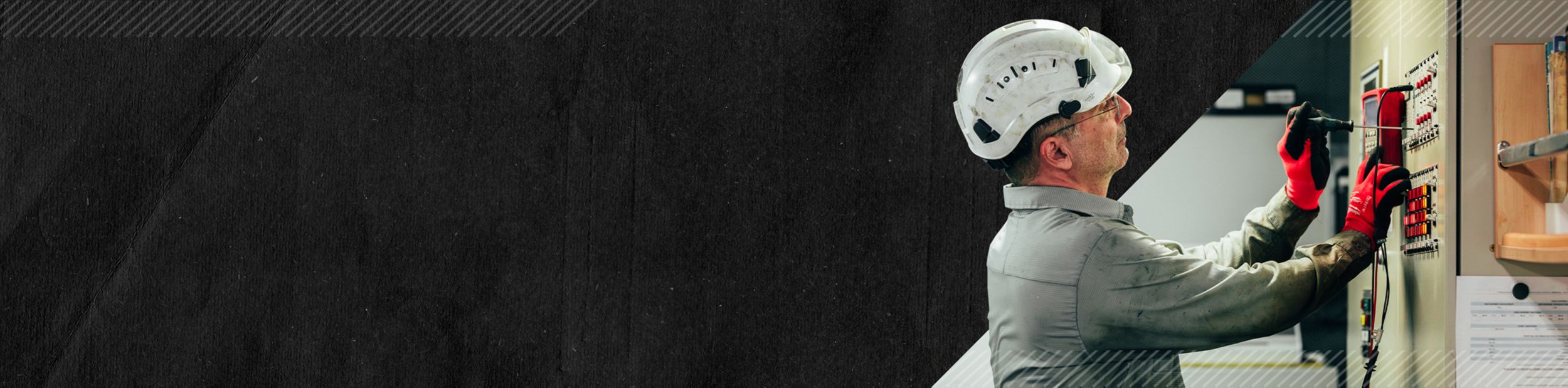 MaK employee repairing equipment