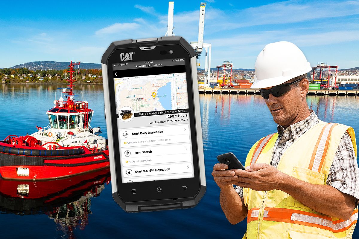 Cat Marine customer looking at his phone showing the Cat Inspect app