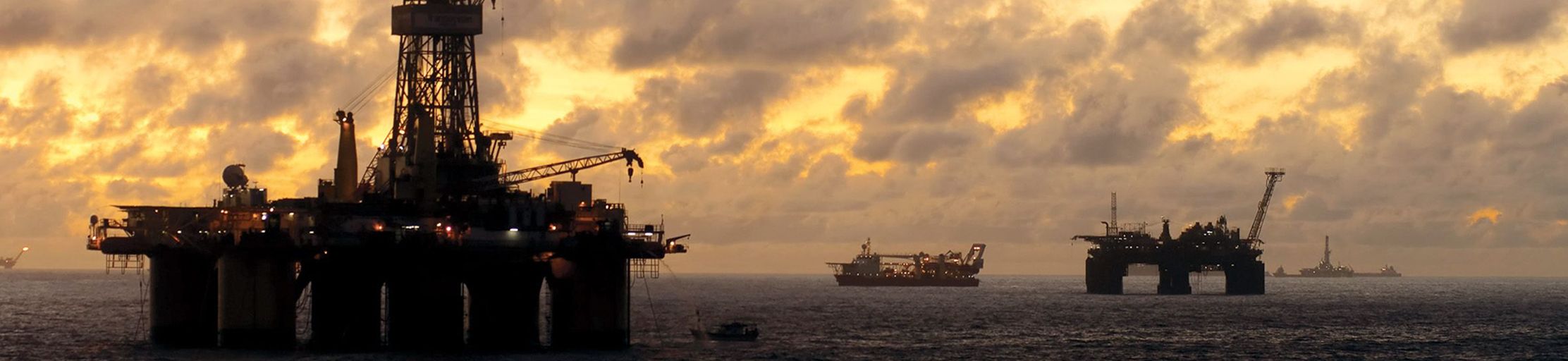 Offshore Drilling rig at sunset