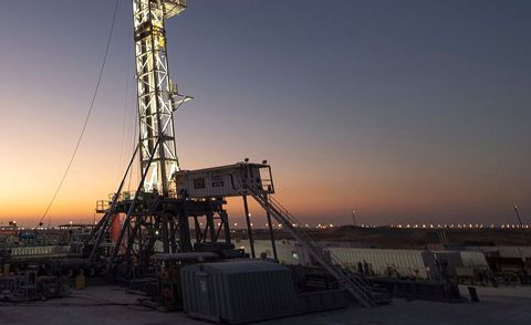 image of a drilling rig at night
