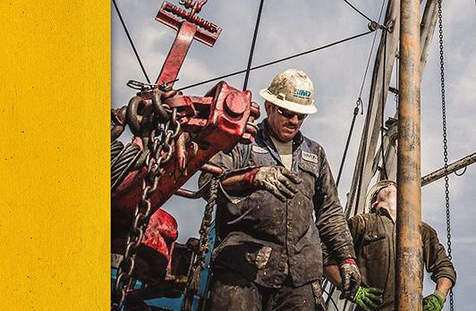 Cat employee working on equipment