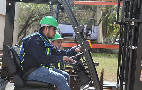 person operating equipment