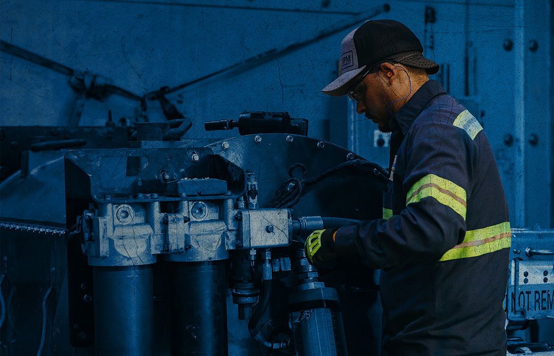 Employee working on machines
