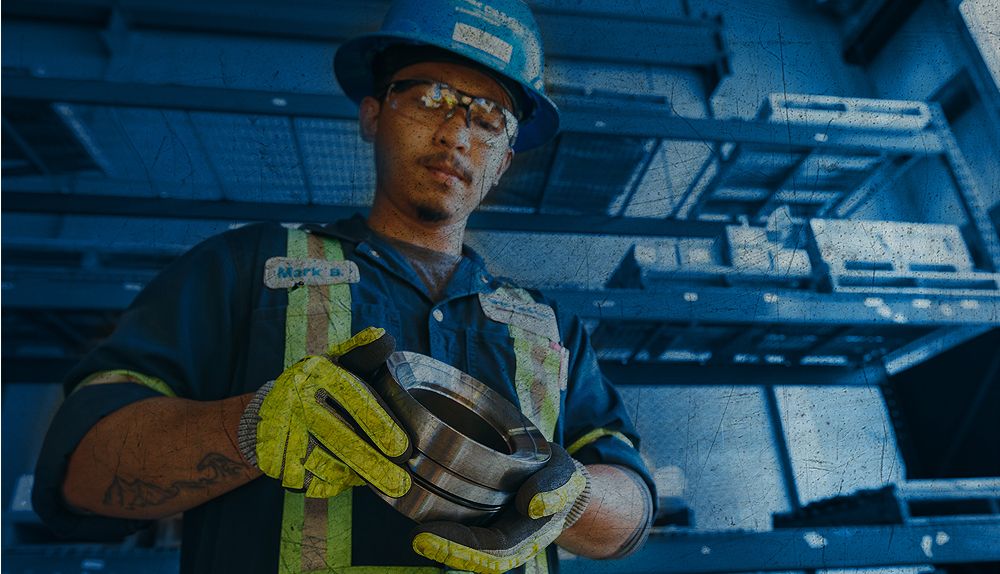 Employee holding a consumable in a facility