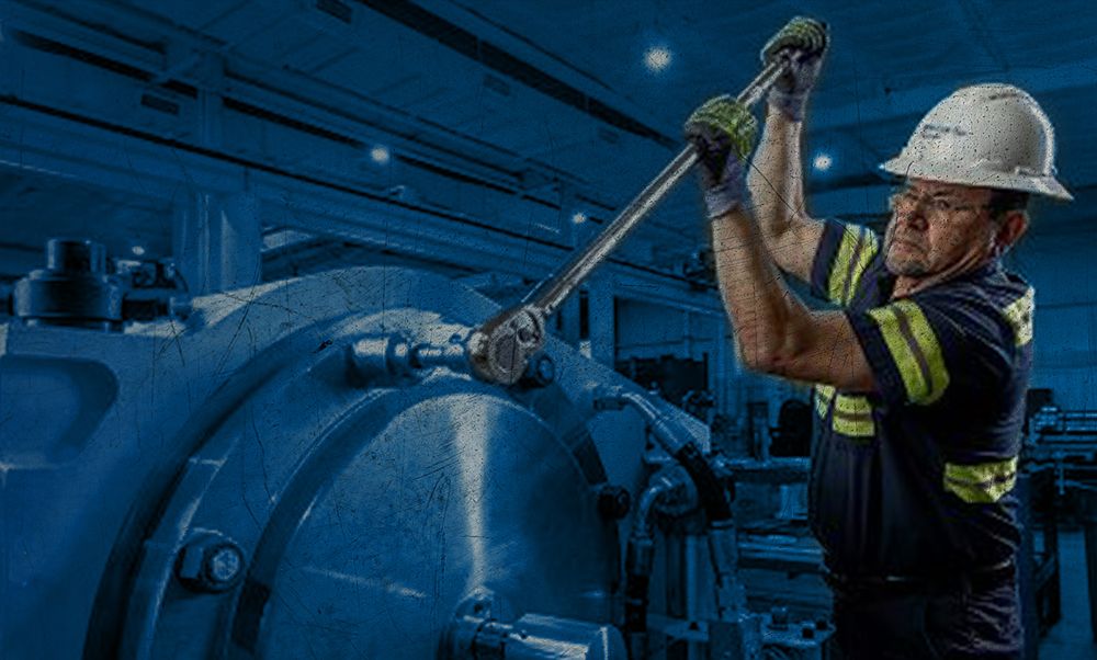 Employee working on a fluid end