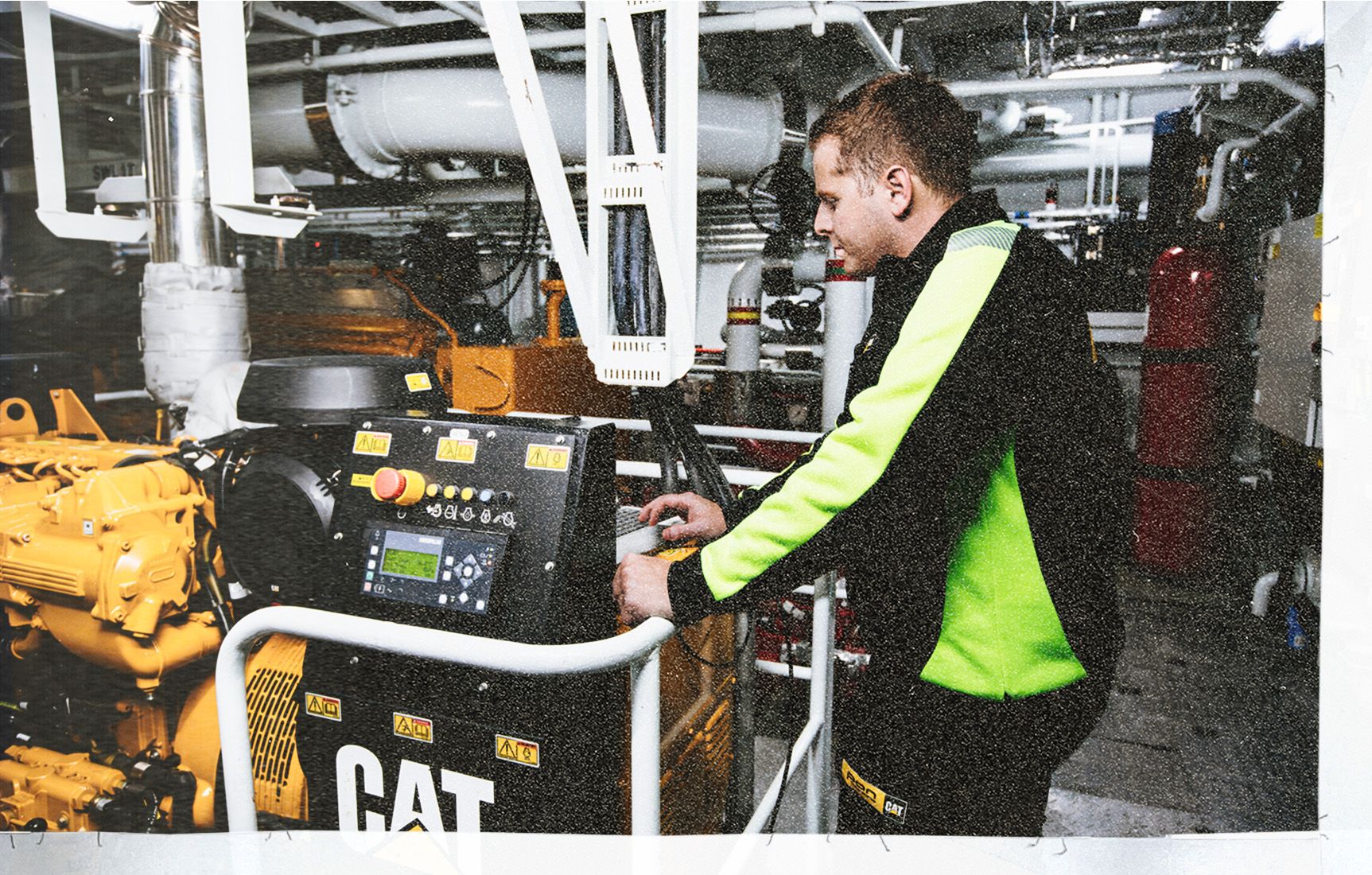 man working on cat system