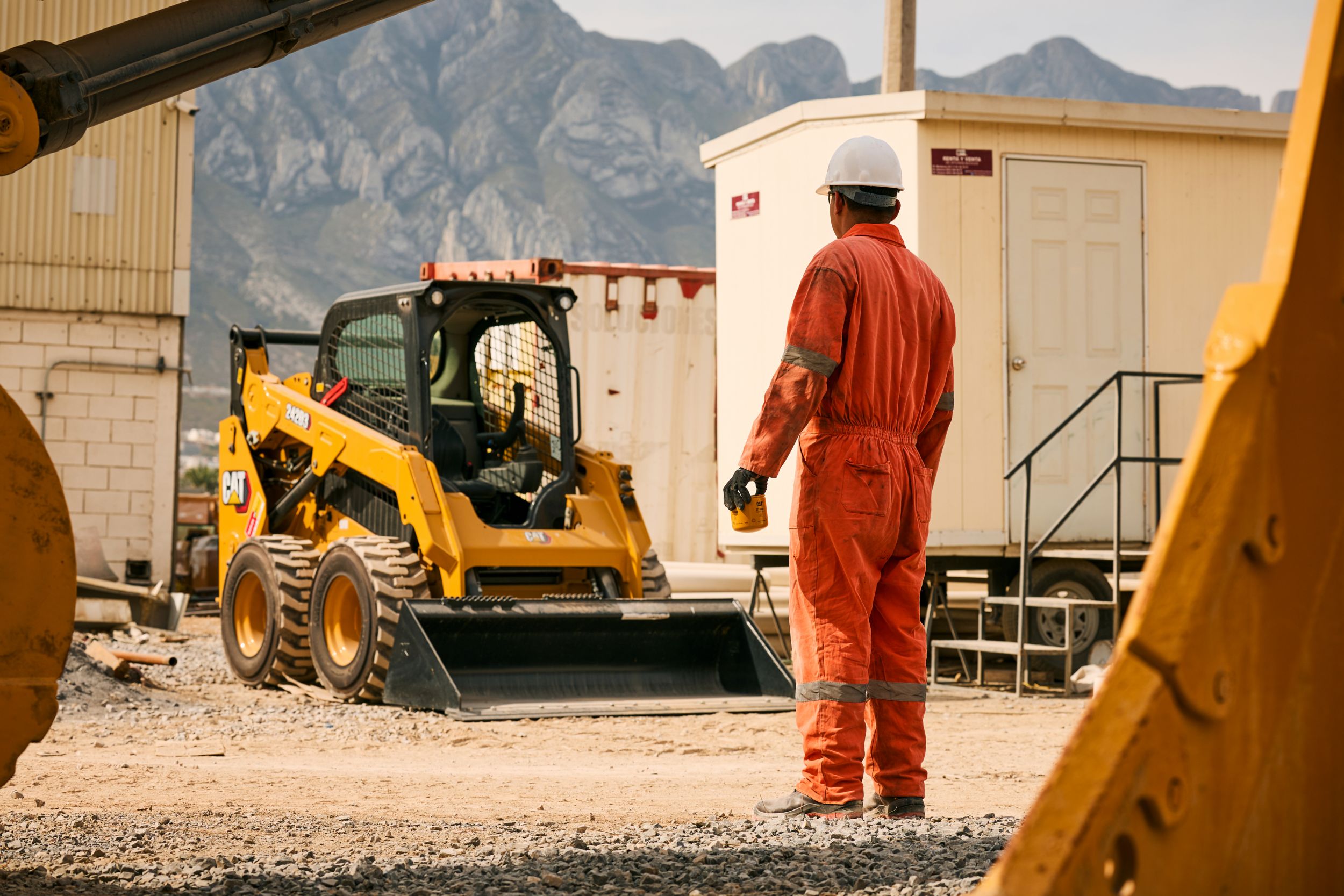 Cat technician and dealer talking