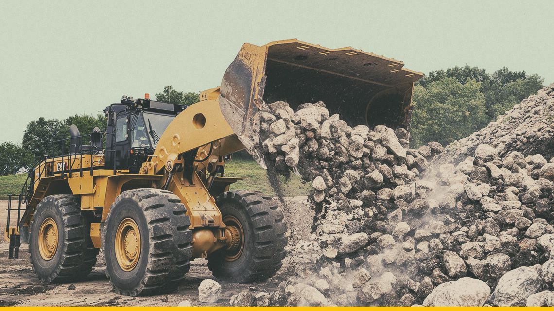 990 Wheel Loader dumping material