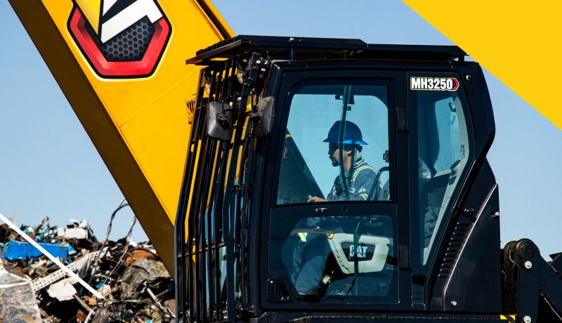 a construction professional operating a material handler