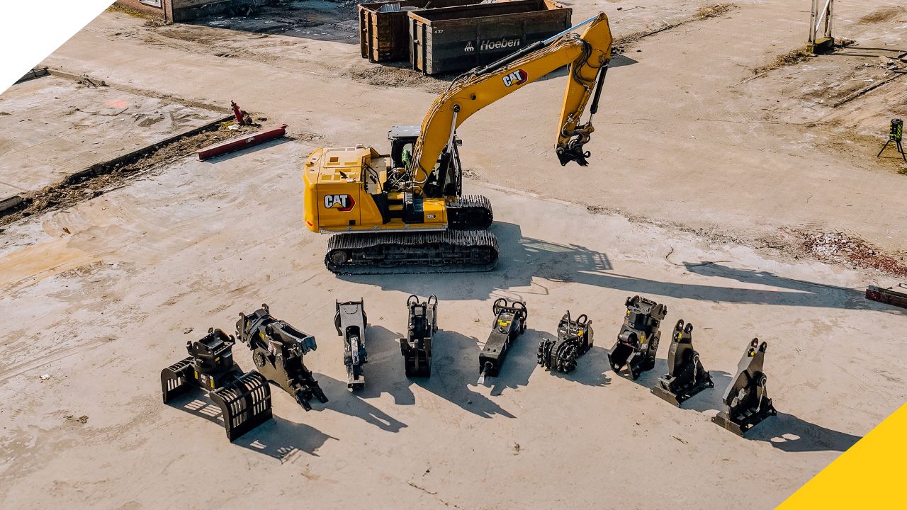 a material handler surrounded by smaller machines