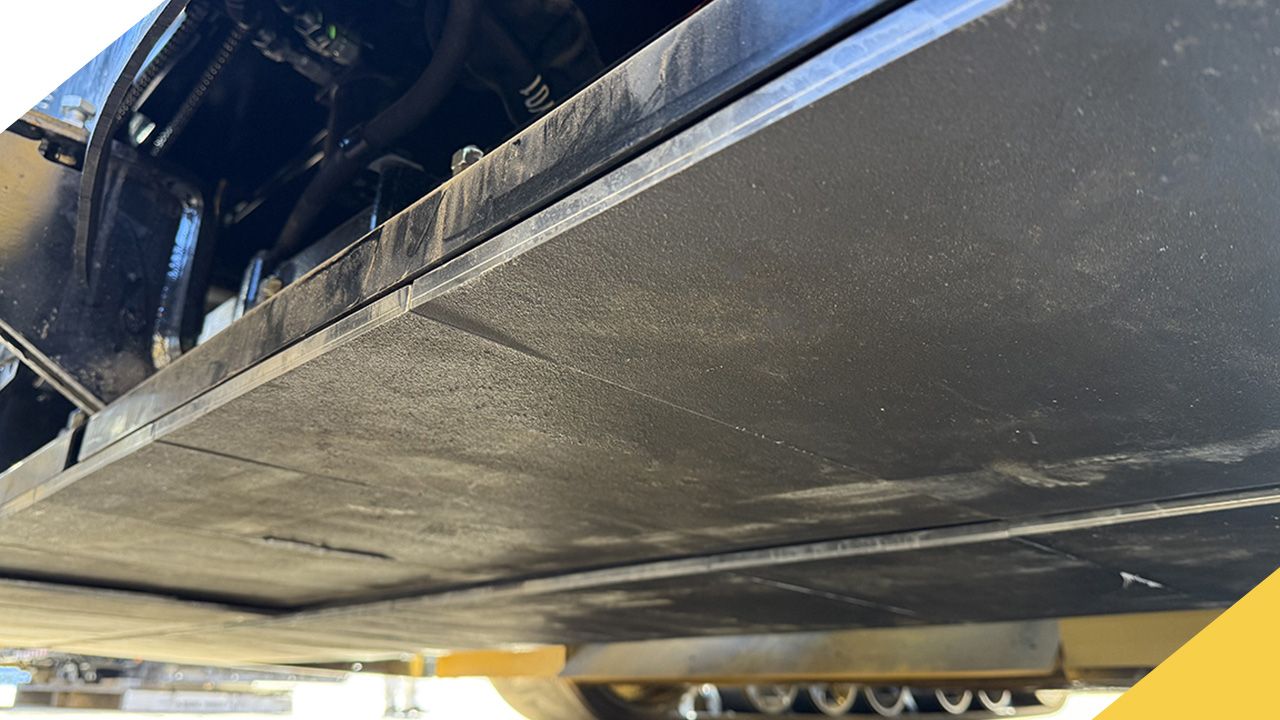the underside of a paving machine