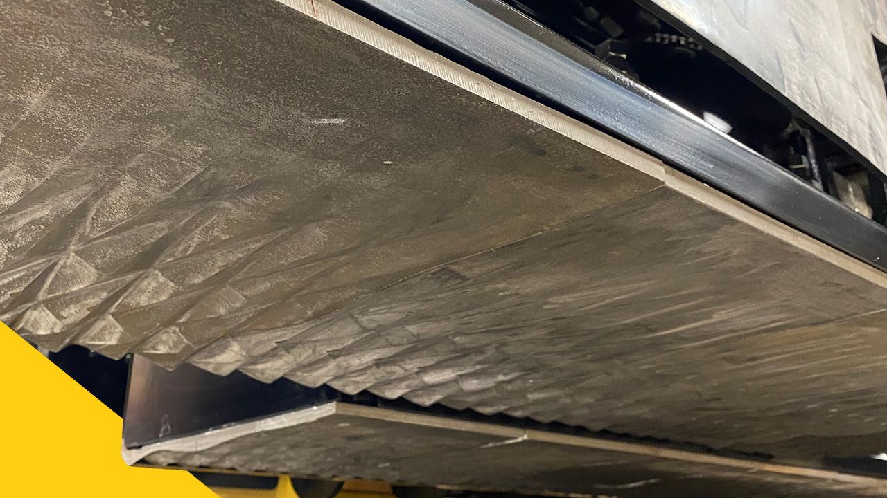 underside of a paving machine