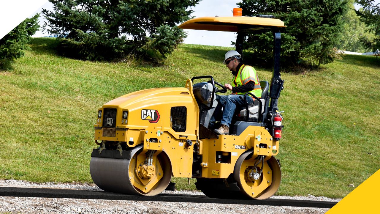 construction professional operating a paving machine