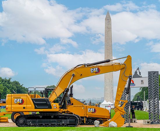 excavator in front of the washington monument
