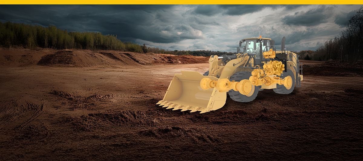 This image shows a wheelloader in a worksite with the major components highlighted.