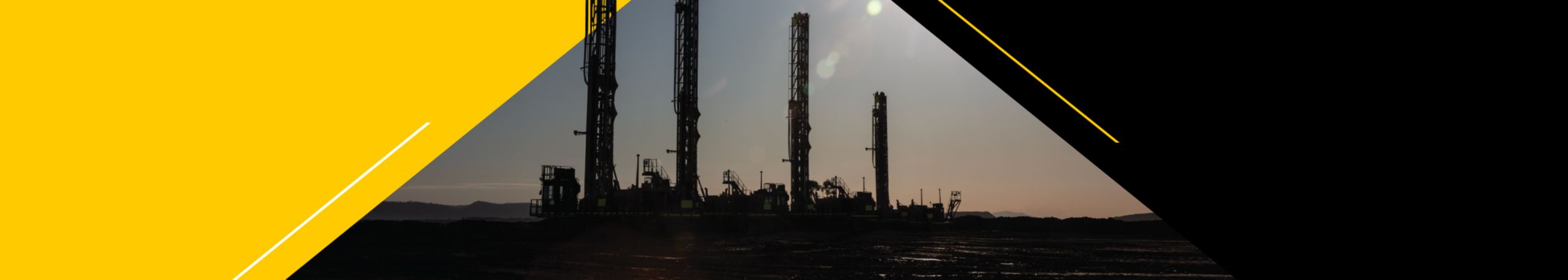 Fleet of Cat drills on mine site