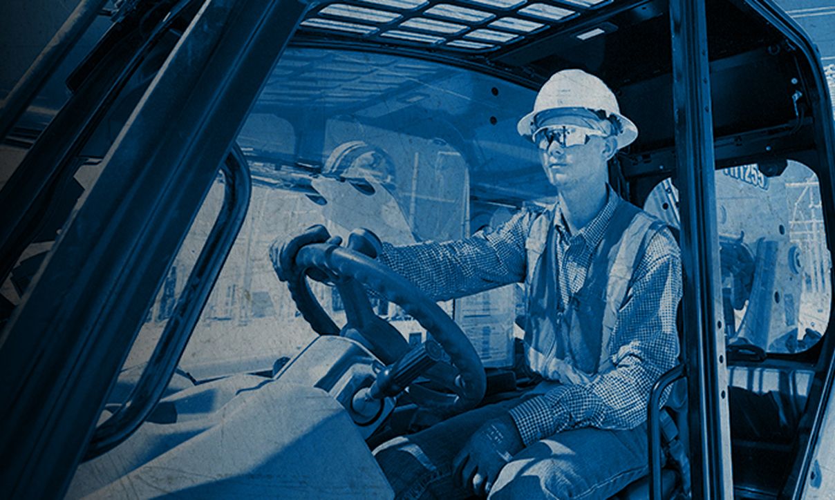 SPM™ Oil & Gas employee in vehicle driving around