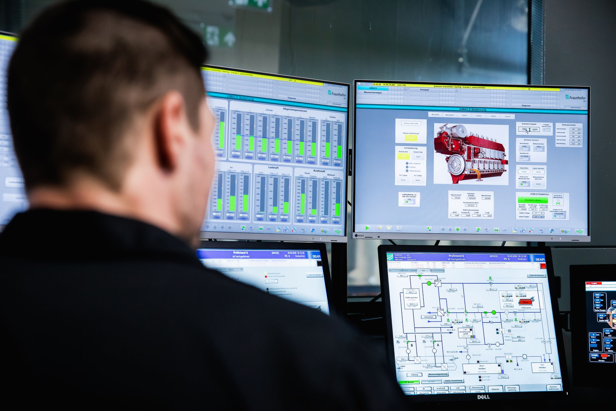 Technician monitoring operational data and MaK engine performance through advanced digital control and monitoring systems.