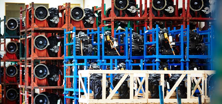 New transmissions stored on metal shelves