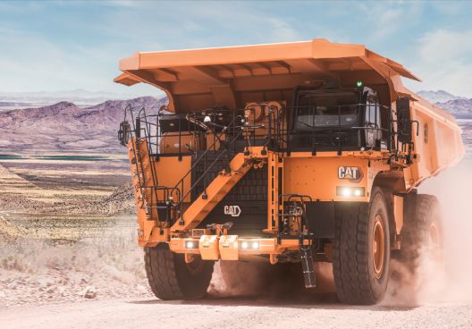 Cat Mining truck traveling on a jobsite