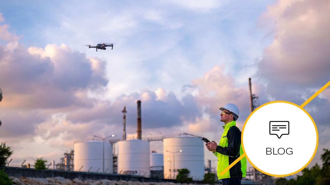 Worker in a high-visibility vest operates a drone to inspect equipment and detect methane leaks at an oil and gas site