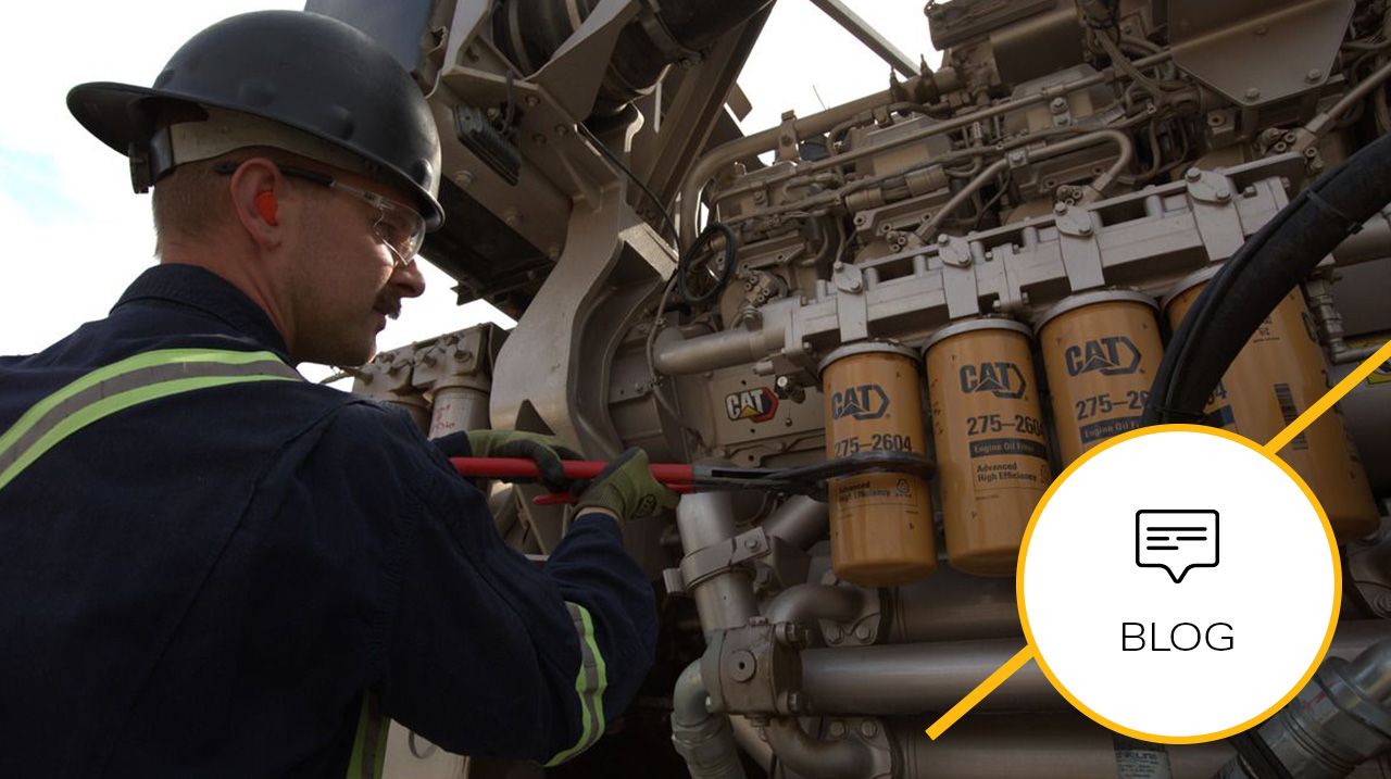 Worker servicing a Cat® Dynamic Gas Blending™ Engine
