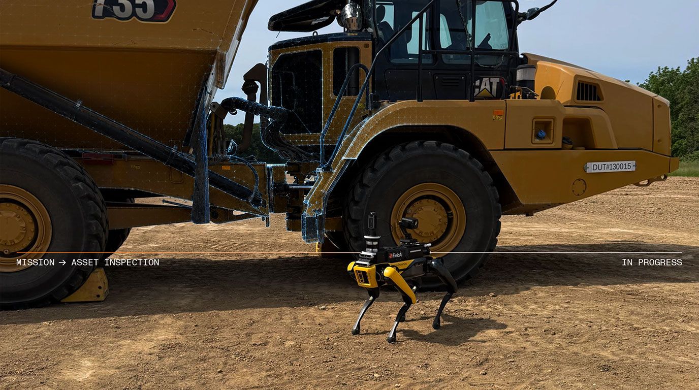 AI Robot standing next to a Cat Articulating Truck