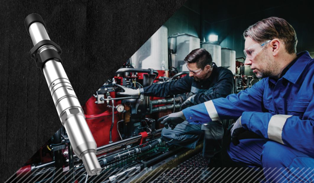 Two workers maintaining dual fuel technology equipment