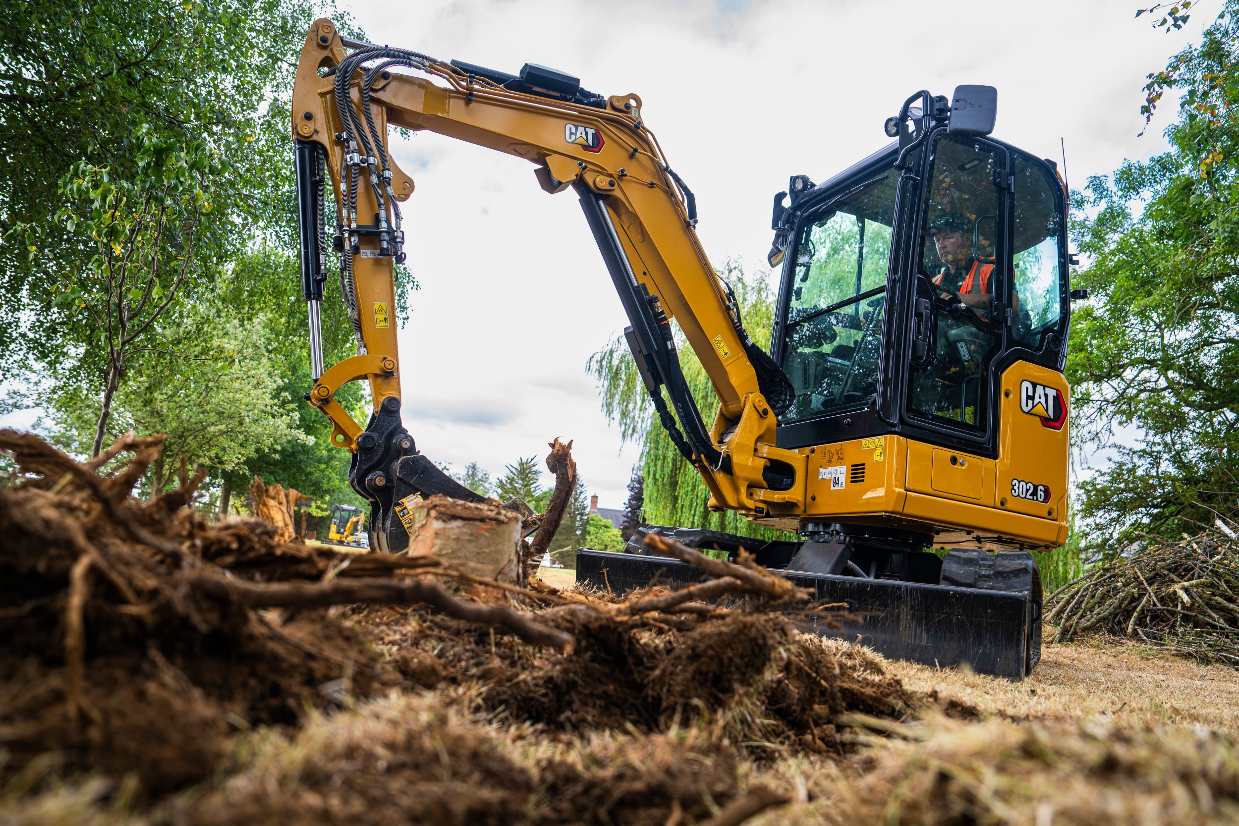 New Cat® 302.4 Compact Radius and 302.6 Mini Excavators | Cat | Caterpillar