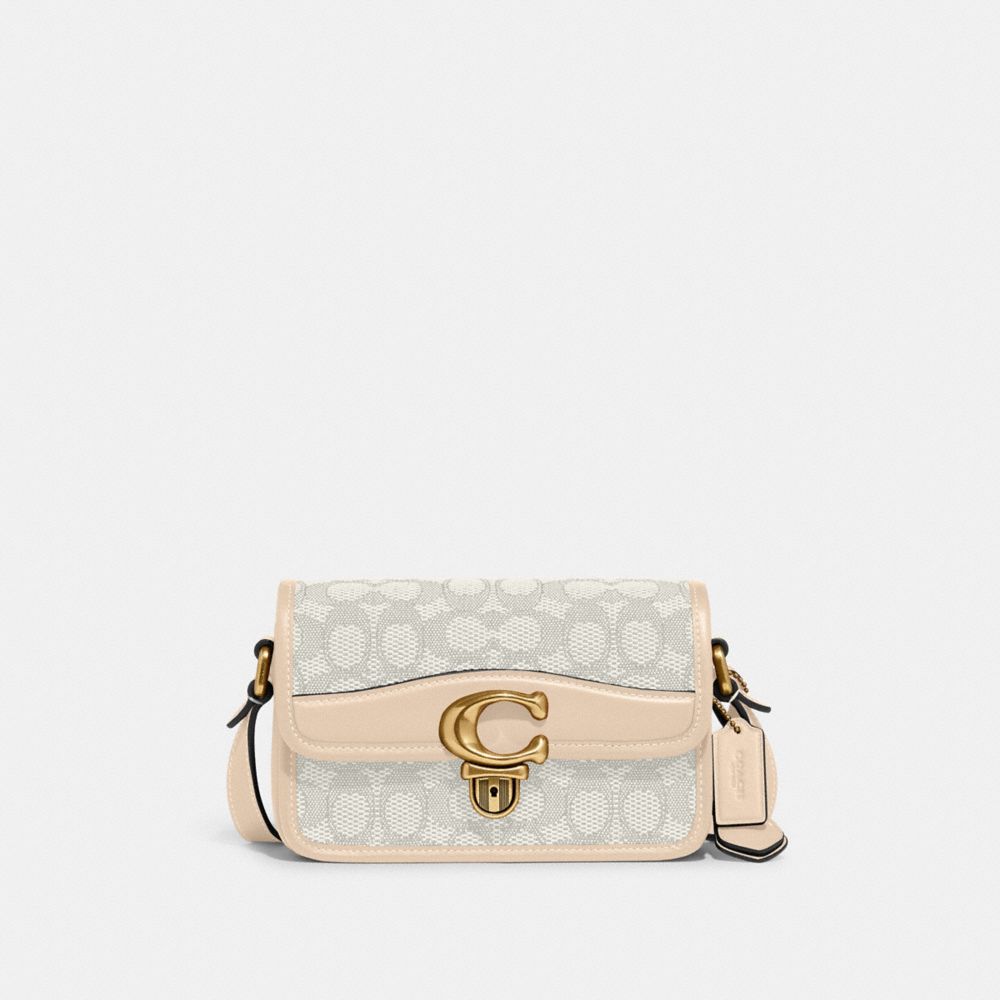 STUDIO SHOULDER BAG 19 IN SIGNATURE JACQUARD