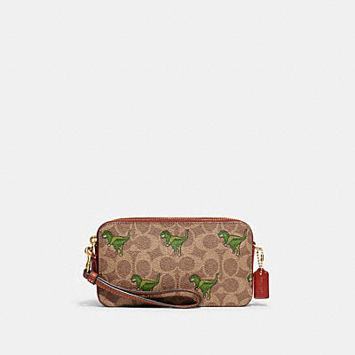 KIRA CROSSBODY IN SIGNATURE CANVAS WITH REXY PRINT