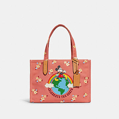 DISNEY X COACH TOTE 30 IN 100 PERCENT RECYCLED CANVAS WITH FLORAL PRINT AND MICKEY MOUSE