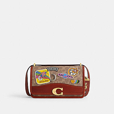 COSMIC COACH BANDIT SHOULDER BAG IN SIGNATURE CANVAS WITH PATCHES